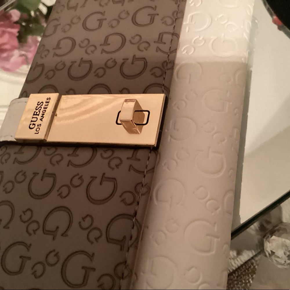 Beautiful guess wallet with gold hardware